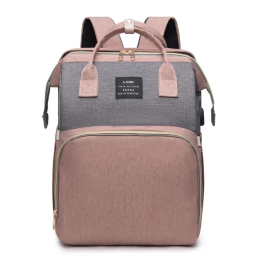 Grote mommy bag met veel vakken, ideaal als luiertas voor op reis. Stijlvol, ruim en praktisch voor elke mama. Bestel nu bij Simplifylux!

Pink and gray diaper backpack with multiple compartments, ideal for travel and daily use by parents.